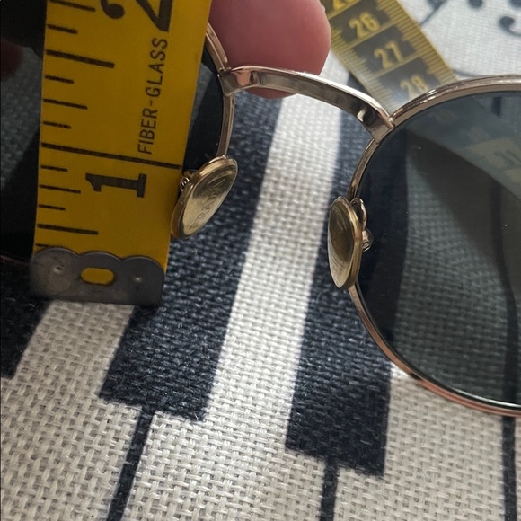 Prada Black and Gold Oval PR 65ZS Model Sunglasses